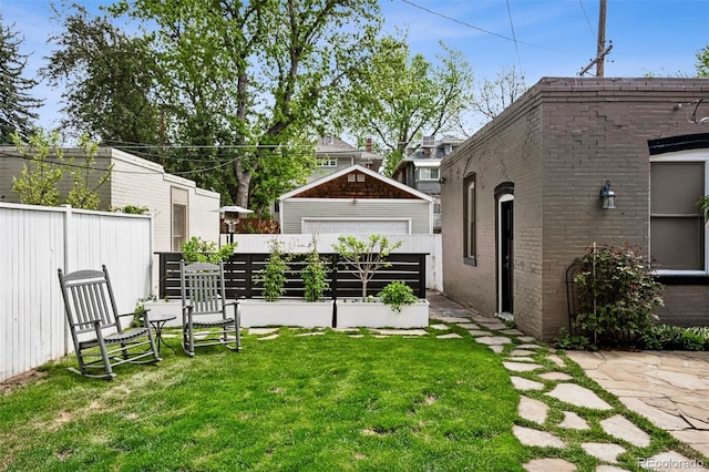 view of yard featuring a garage