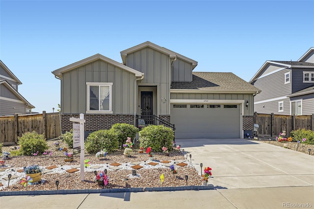 6924 E 118th Pl, Thornton, CO 80233 - view of front of house featuring board and batten siding, an attached garage, and brick siding