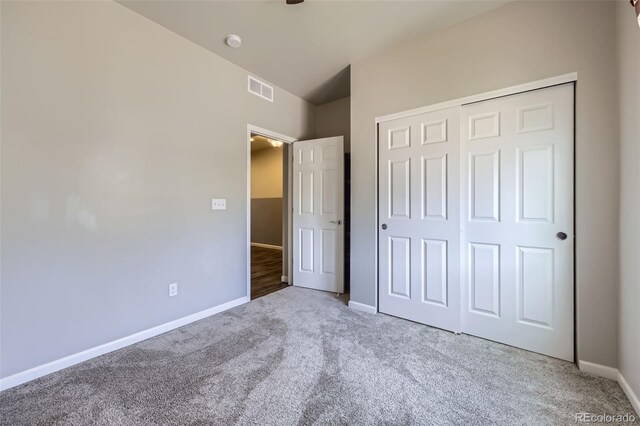 6924 E 118th Pl, Thornton, CO 80233 - unfurnished bedroom with carpet floors, baseboards, and a closet