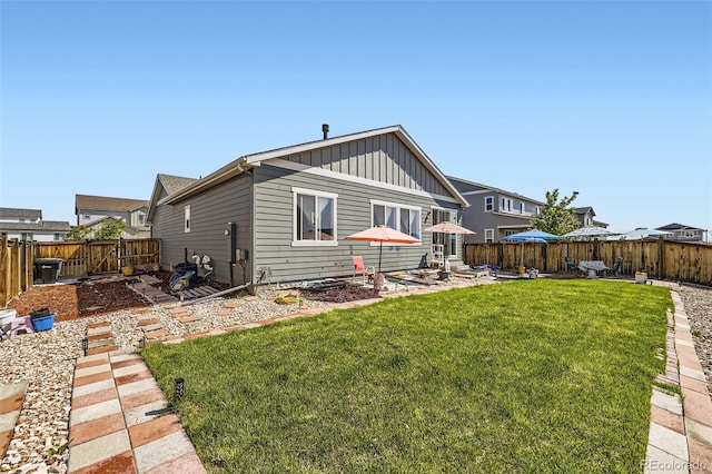 6924 E 118th Pl, Thornton, CO 80233 - rear view of property featuring board and batten siding and a patio