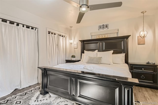 bedroom featuring a ceiling fan and light wood-style floors