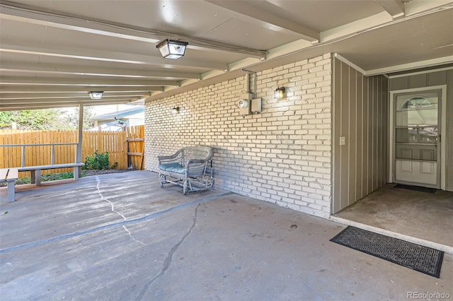 view of patio featuring fence