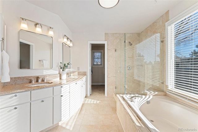 bathroom with a garden tub, tile patterned flooring, vaulted ceiling, vanity, and a shower stall