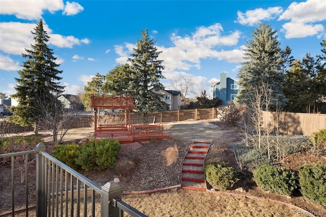 view of yard featuring a fenced backyard