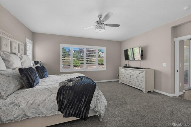 bedroom with ceiling fan and light carpet