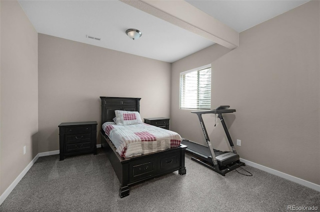 carpeted bedroom with baseboards and visible vents