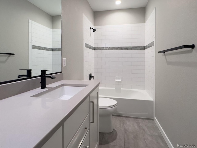 bathroom featuring vanity, bathtub / shower combination, and toilet