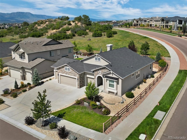 birds eye view of property featuring a residential view and a mountain view