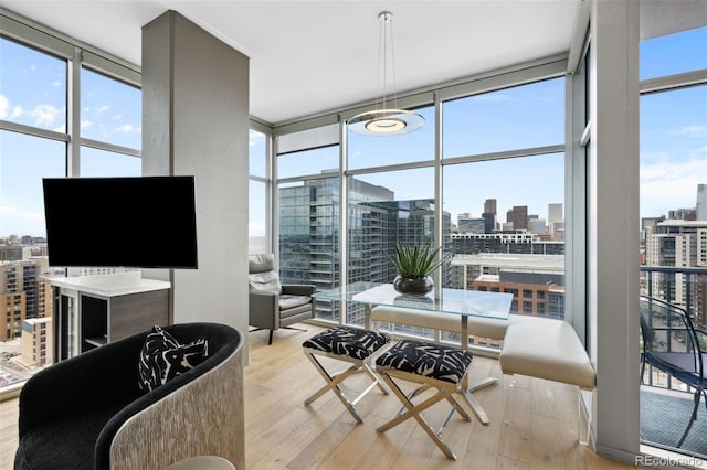 sunroom / solarium with a city view