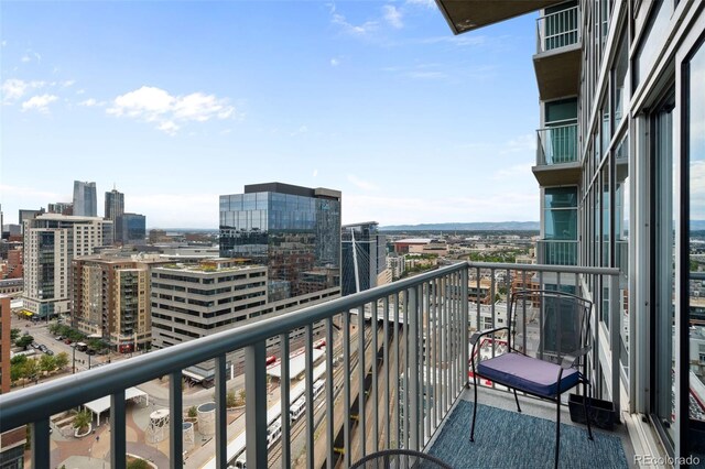 balcony featuring a city view