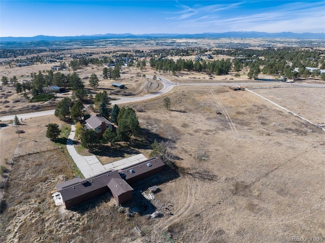 drone / aerial view featuring a mountain view