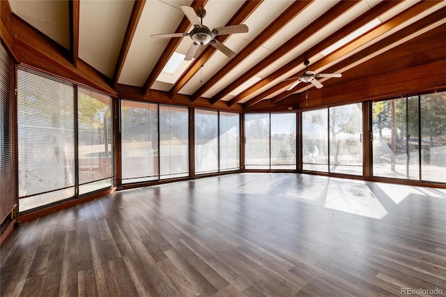 unfurnished sunroom with vaulted ceiling with skylight and ceiling fan