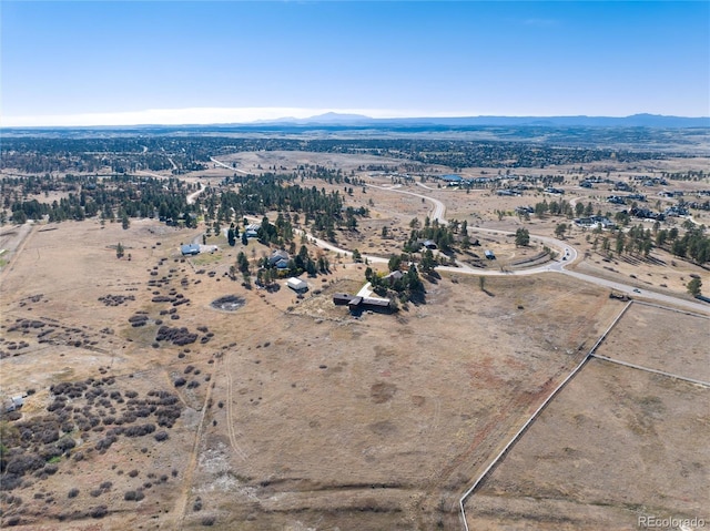 bird's eye view with a mountain view