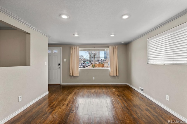 1996 S Dexter St, Denver, CO 80222 - spare room featuring ornamental molding, wood-type flooring, and recessed lighting