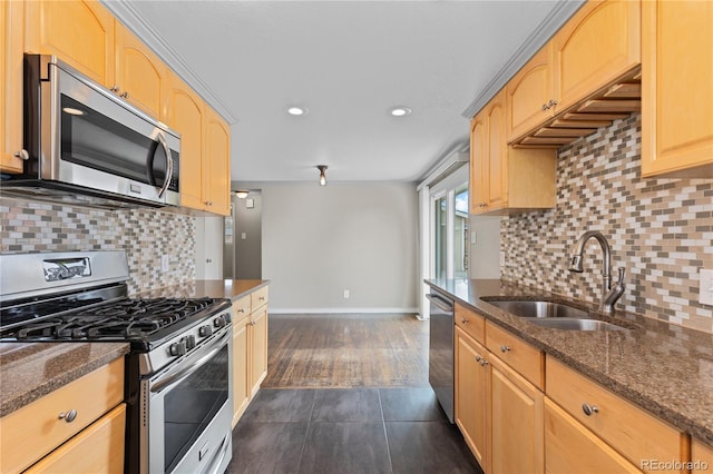 1996 S Dexter St, Denver, CO 80222 - kitchen with stainless steel appliances, light brown cabinets, recessed lighting, and dark stone counters