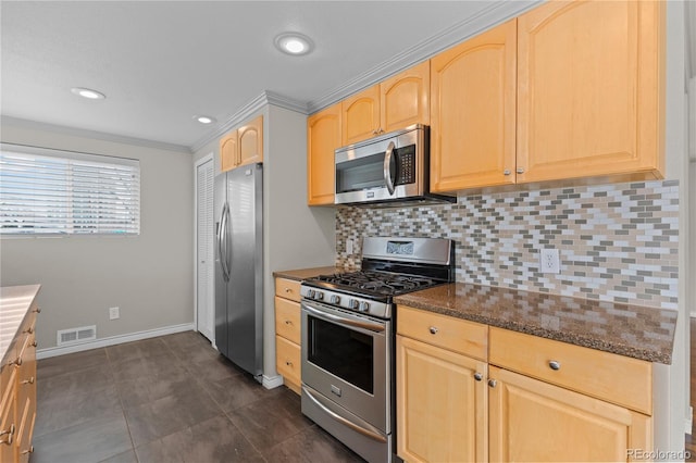 1996 S Dexter St, Denver, CO 80222 - kitchen featuring appliances with stainless steel finishes, light brown cabinetry, backsplash, dark stone countertops, and crown molding