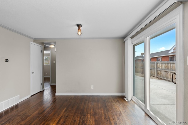 1996 S Dexter St, Denver, CO 80222 - spare room featuring ornamental molding and wood finished floors