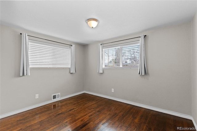 1996 S Dexter St, Denver, CO 80222 - unfurnished room featuring baseboards and wood finished floors