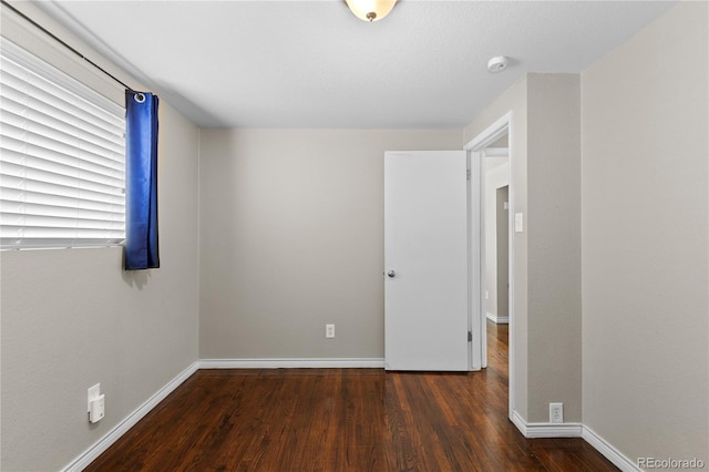 1996 S Dexter St, Denver, CO 80222 - unfurnished bedroom featuring wood finished floors and baseboards