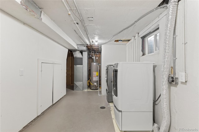 1996 S Dexter St, Denver, CO 80222 - below grade area featuring water heater, washer and clothes dryer, and heating unit