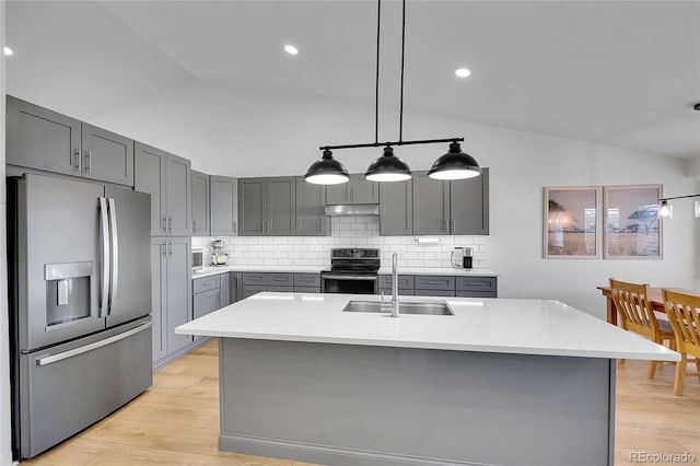 525 Badger Creek Dr, Brighton, CO 80601 - kitchen with stainless steel fridge with ice dispenser, gray cabinetry, lofted ceiling, electric range, and light countertops