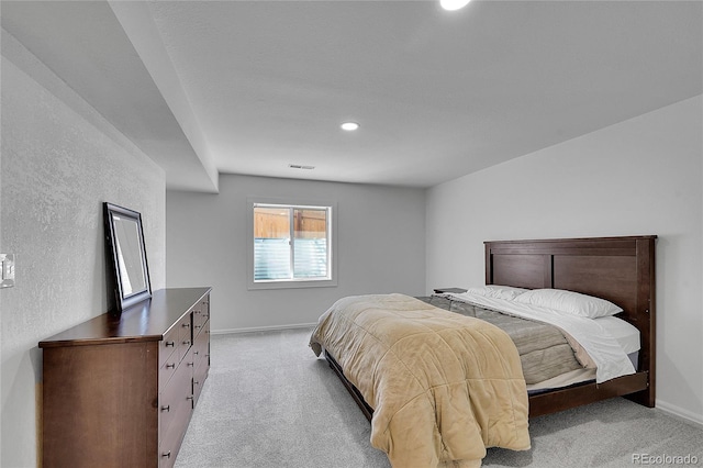525 Badger Creek Dr, Brighton, CO 80601 - bedroom with light colored carpet and recessed lighting