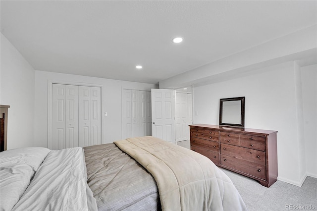 525 Badger Creek Dr, Brighton, CO 80601 - bedroom featuring multiple closets, carpet, and recessed lighting