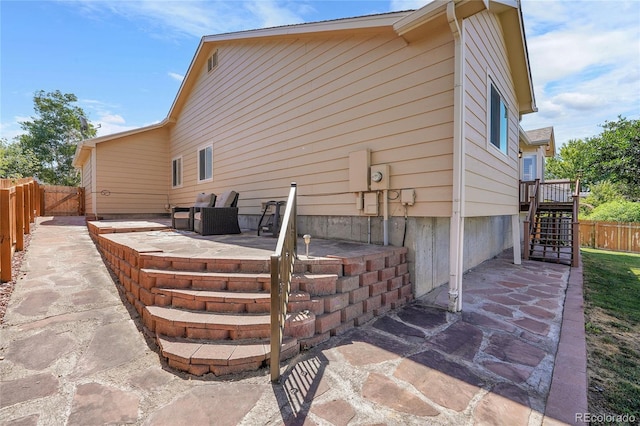 525 Badger Creek Dr, Brighton, CO 80601 - fenced backyard with a patio area and stairs