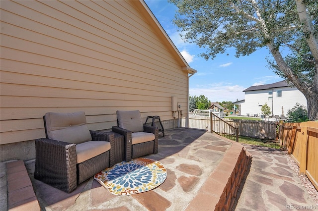 525 Badger Creek Dr, Brighton, CO 80601 - fenced backyard with a patio area