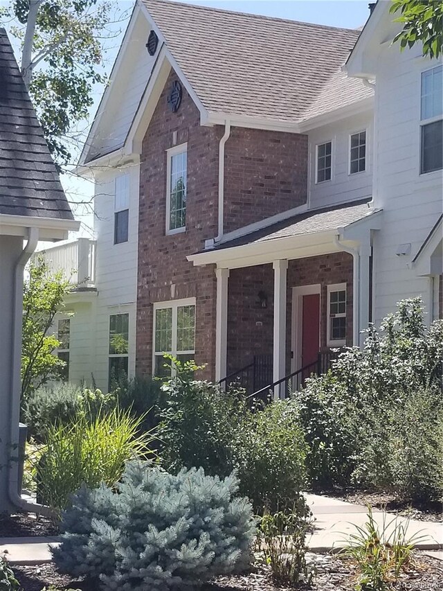 view of front of property with a balcony