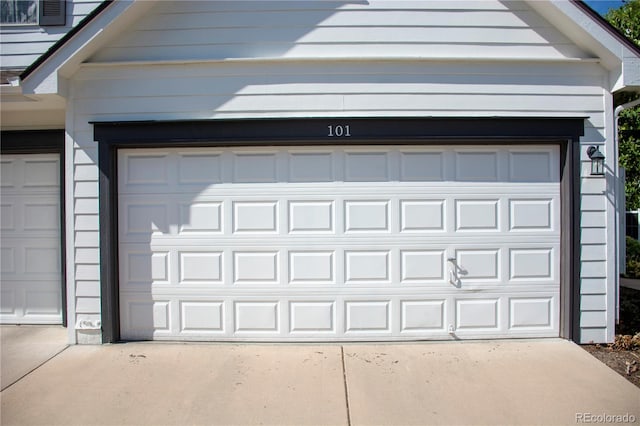 8802 E 24th Pl Unit 101, Denver, CO 80238 - garage with concrete driveway