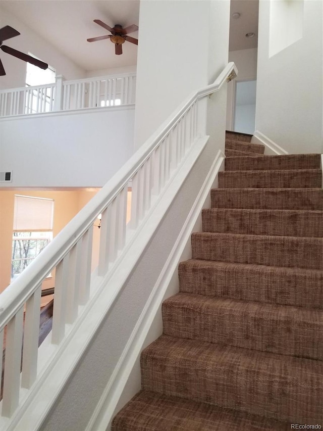 8802 E 24th Pl Unit 101, Denver, CO 80238 - stairway featuring a ceiling fan