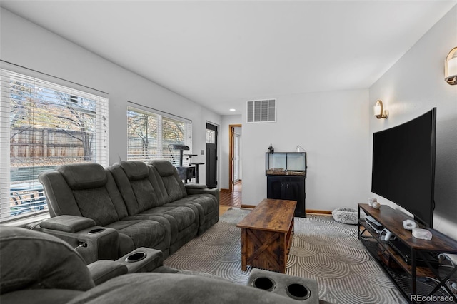 2362 S Troy St, Aurora, CO 80014 - living area featuring wood finished floors and baseboards