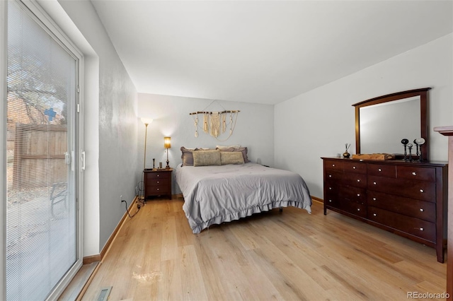 2362 S Troy St, Aurora, CO 80014 - bedroom featuring light wood-type flooring and baseboards