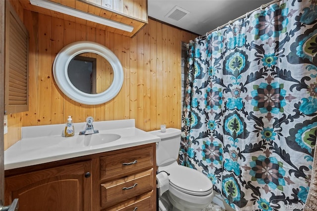 2362 S Troy St, Aurora, CO 80014 - bathroom featuring wooden walls, vanity, and a shower with curtain