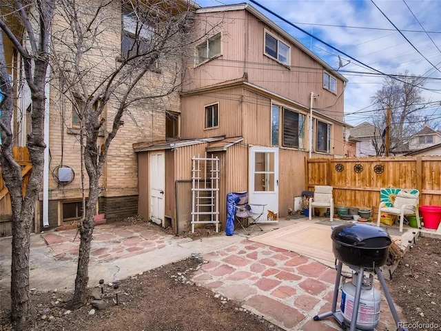 rear view of property with a patio area