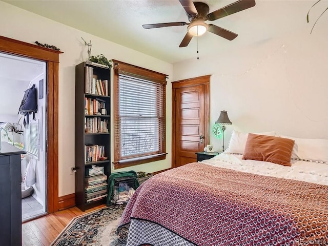 bedroom featuring light hardwood / wood-style flooring and ceiling fan