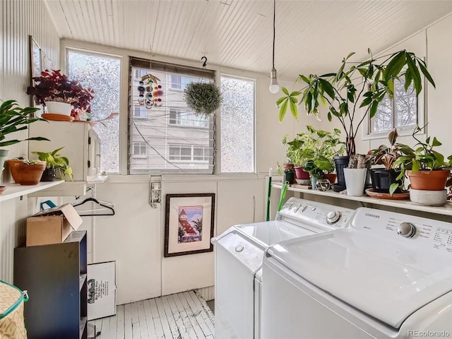 laundry area with independent washer and dryer