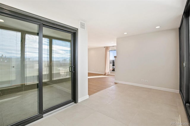 view of tiled empty room