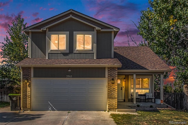 front of property with a garage