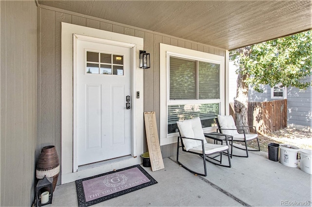 doorway to property featuring a porch