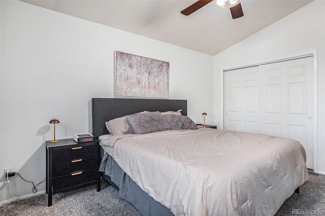 bedroom with carpet flooring, lofted ceiling, a closet, and ceiling fan