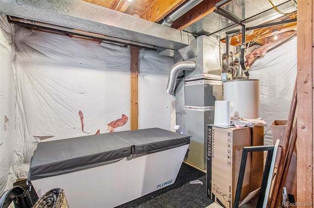 utility room with gas water heater