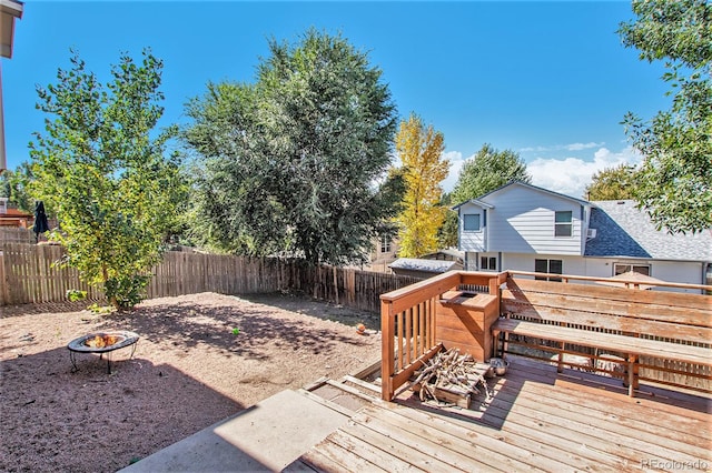 deck with a fire pit