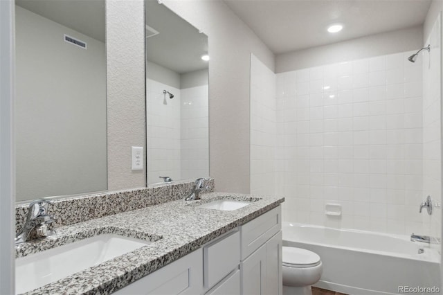 7307 Dolores Ave, Frederick, CO 80530 - full bathroom featuring double vanity,  shower combination, and recessed lighting