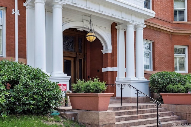 836 E 17th Ave Unit 1A, Denver, CO 80218 - entrance to property featuring a porch and brick siding