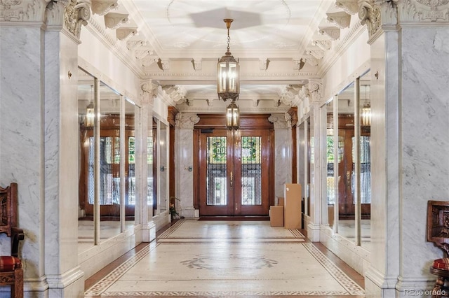 836 E 17th Ave Unit 1A, Denver, CO 80218 - foyer entrance featuring french doors, crown molding, and wood finished floors