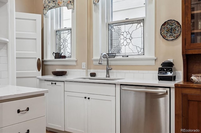 836 E 17th Ave Unit 1A, Denver, CO 80218 - kitchen featuring dishwasher and white cabinetry