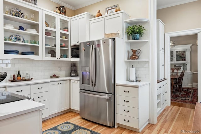 836 E 17th Ave Unit 1A, Denver, CO 80218 - kitchen with stainless steel refrigerator with ice dispenser, open shelves, crown molding, light wood-style flooring, and decorative backsplash