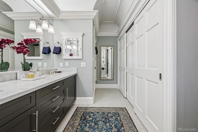 836 E 17th Ave Unit 1A, Denver, CO 80218 - full bath with double vanity, tile patterned flooring, and ornamental molding